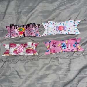 Handmade Hair clip bows for girls that are candy themed.